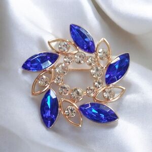 Elegant Blue and Gold Floral Brooch